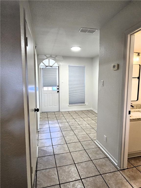 4816 Delwood Street, Unit 3 Corpus Christi, TX 78413 - Photo 5 of 19 a view of a hallway with a kitchen