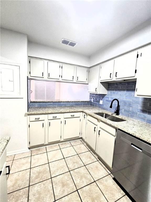 4816 Delwood Street, Unit 3 Corpus Christi, TX 78413 - Photo 8 of 19 a kitchen with granite countertop a sink and cabinets