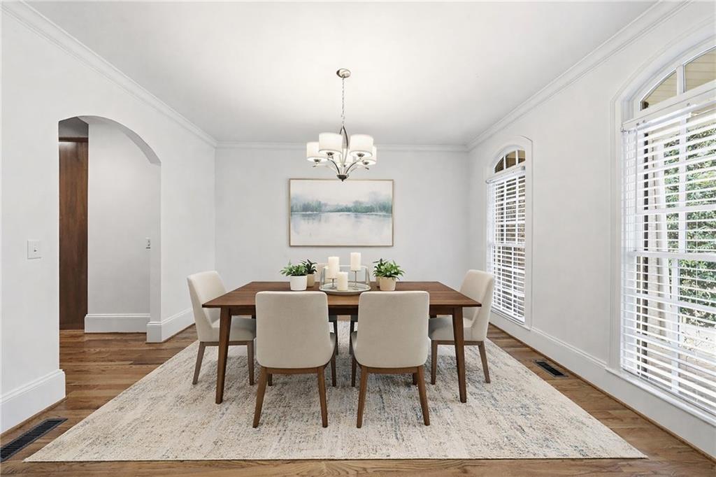 125 River N Circle Sandy Springs, GA 30328 - Photo 4 of 96 a view of a dining room with furniture window and wooden floor