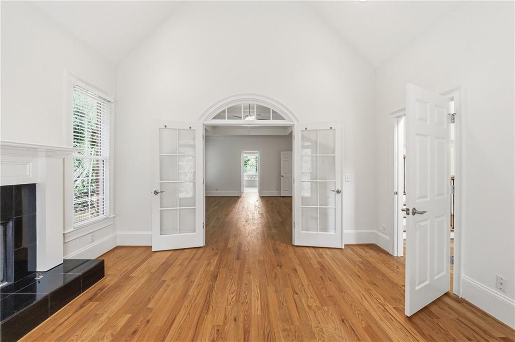 125 River N Circle Sandy Springs, GA 30328 - Photo 45 of 96 a view of a house with wooden floor and fireplace