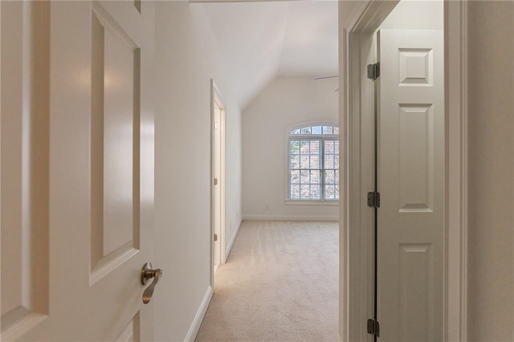 125 River N Circle Sandy Springs, GA 30328 - Photo 60 of 96 a view of an empty room with windows and closet