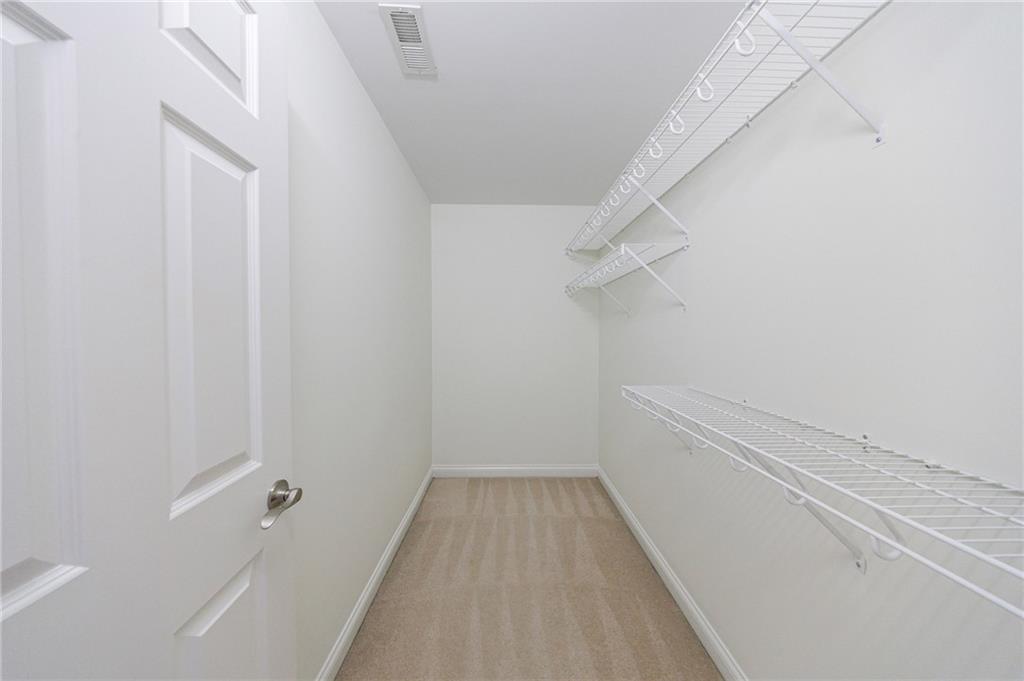 125 River N Circle Sandy Springs, GA 30328 - Photo 61 of 96 a view of a hallway with white walls