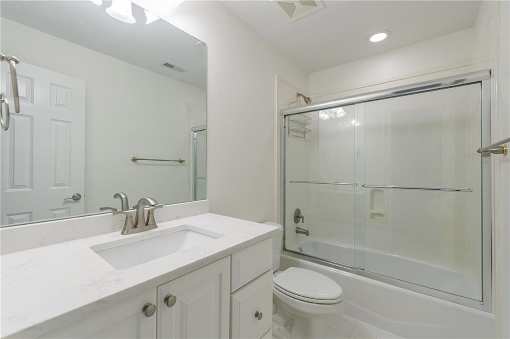 125 River N Circle Sandy Springs, GA 30328 - Photo 74 of 96 a bathroom with a sink toilet and shower