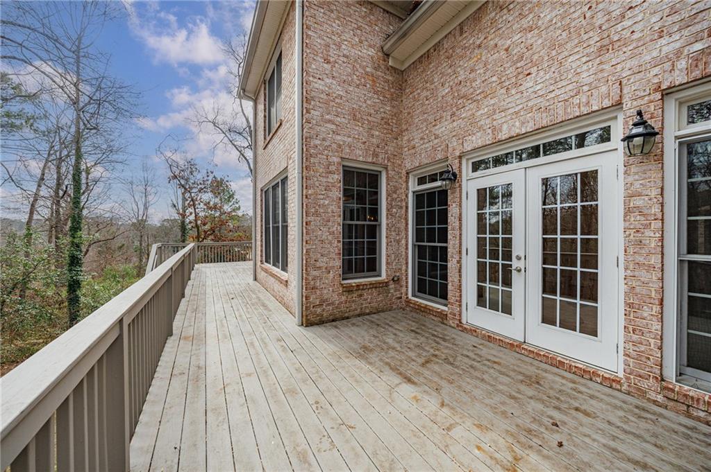 125 River N Circle Sandy Springs, GA 30328 - Photo 89 of 96 a view of balcony with wooden floor and fence