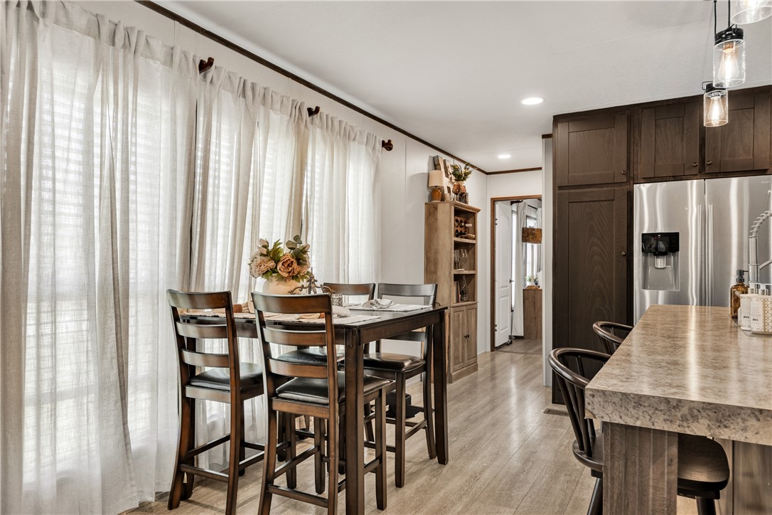 3133 Henderson Road Navasota, TX 77868 - Photo 11 of 26 a view of a dining room with furniture and window