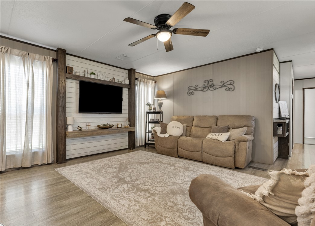 3133 Henderson Road Navasota, TX 77868 - Photo 13 of 26 a living room with furniture and a flat screen tv