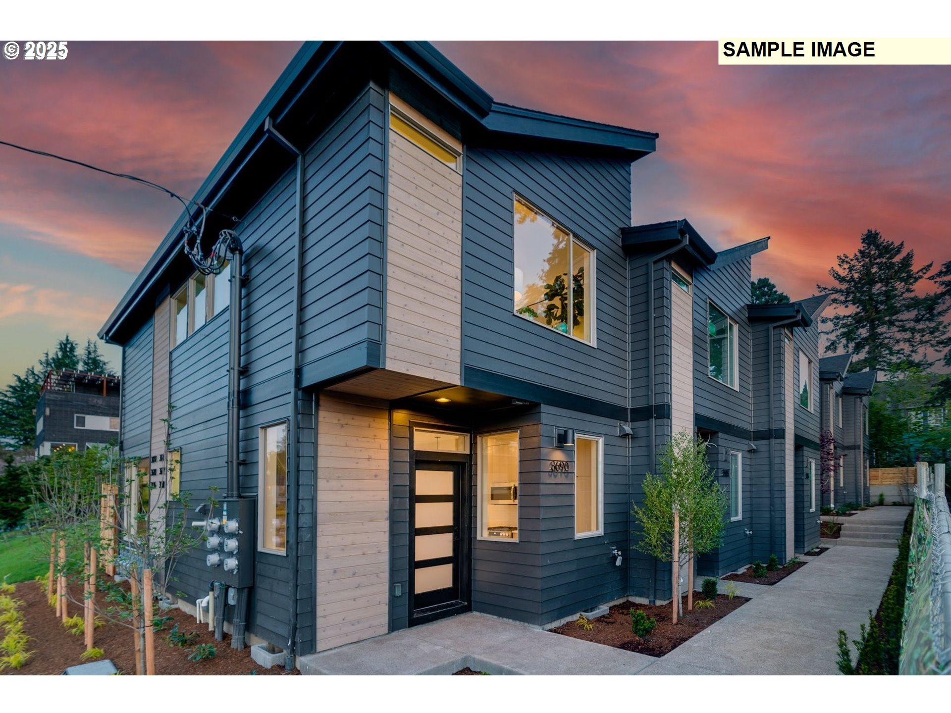3674 Southeast Haig Street Portland, OR 97202 - Photo 1 of 20 a front view of a house with glass windows