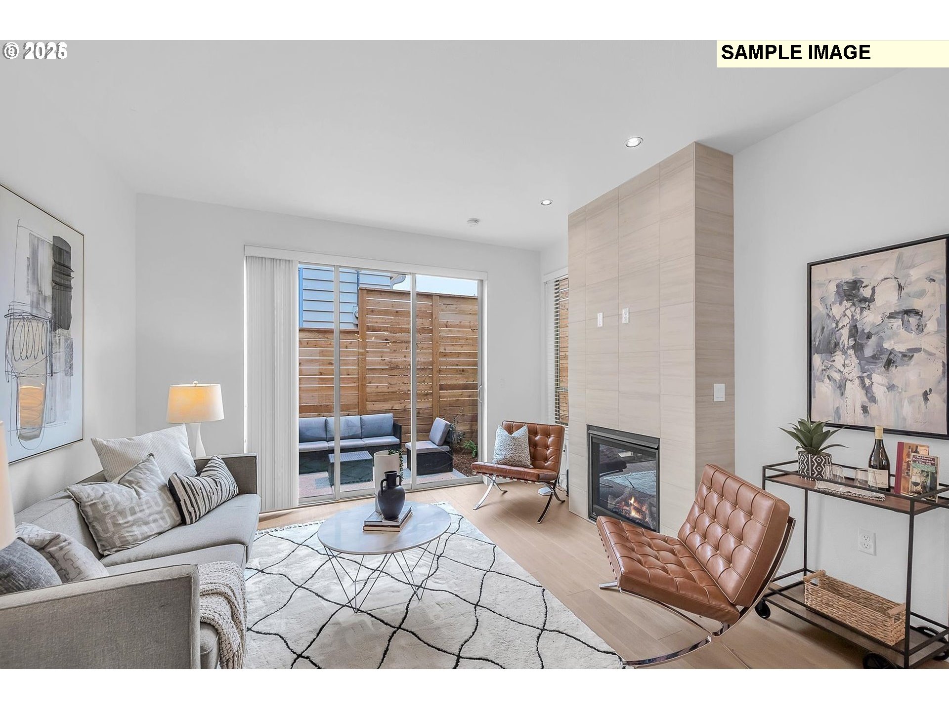 3674 Southeast Haig Street Portland, OR 97202 - Photo 10 of 20 a living room with furniture and a large window