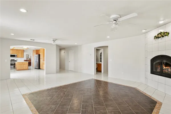 a view of a hallway with entryway and window