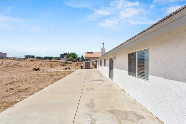 a view of a house with a terrace