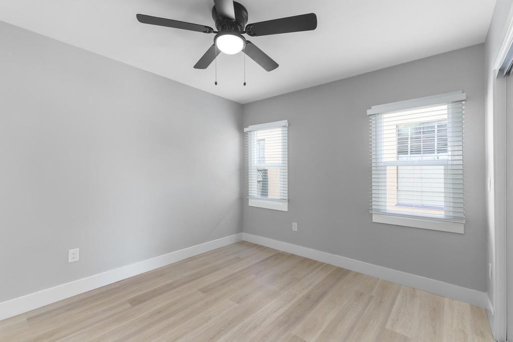 128 Bristol Boulevard San Leandro, CA 94577 - Photo 17 of 32 an empty room with a window and a fan