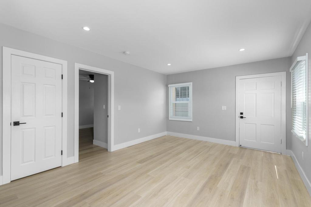 128 Bristol Boulevard San Leandro, CA 94577 - Photo 18 of 32 wooden floor in an empty room with a window