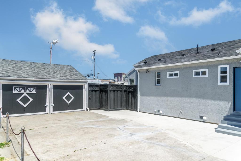 128 Bristol Boulevard San Leandro, CA 94577 - Photo 23 of 32 a front view of a house with a garage