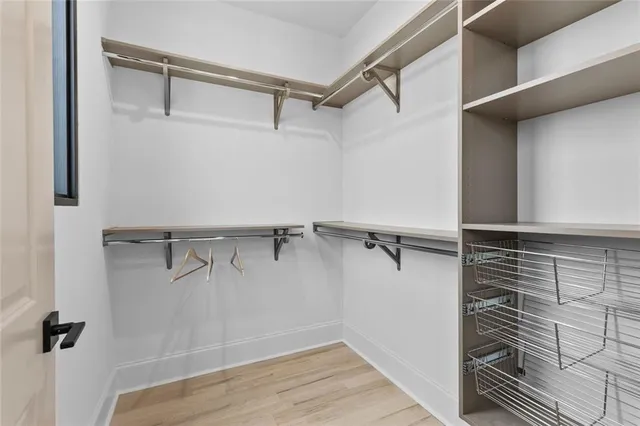 a view of a walk in closet