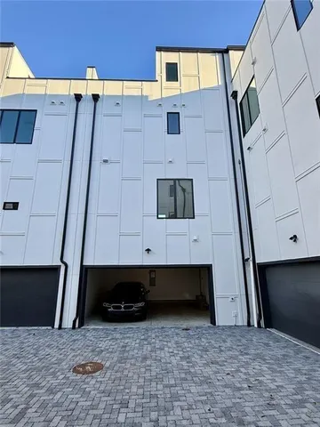 a view of a refrigerator in a kitchen