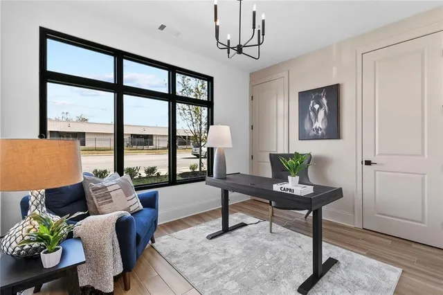 a living room with furniture and a window