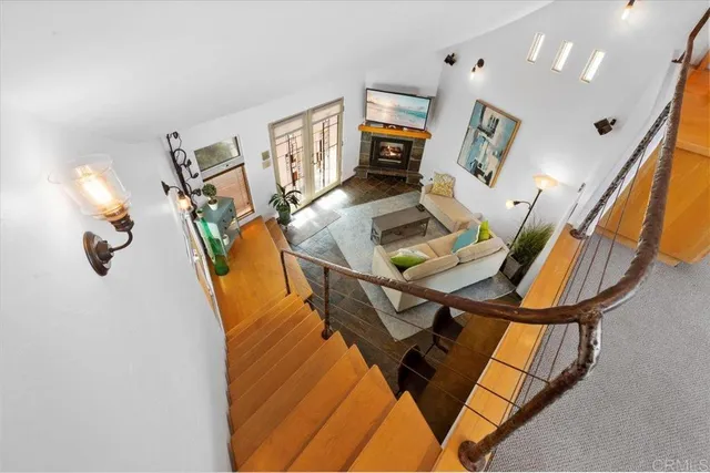 a view of an entryway with wooden floor