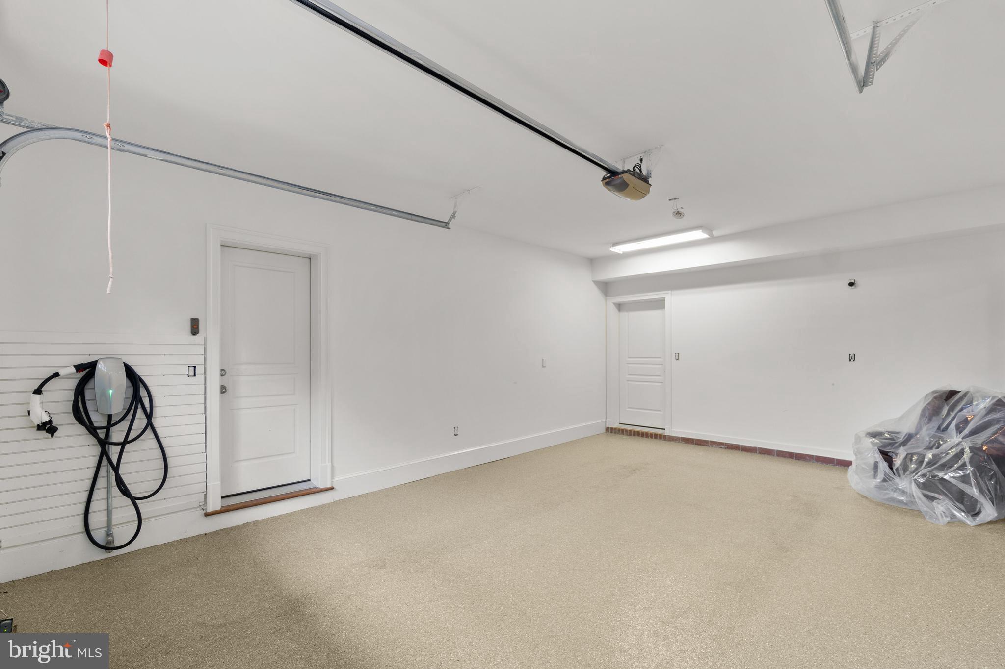 10818 Red Barn Lane Potomac, MD 20854 - Photo 116 of 141 1 car garage with electric vehicle charger