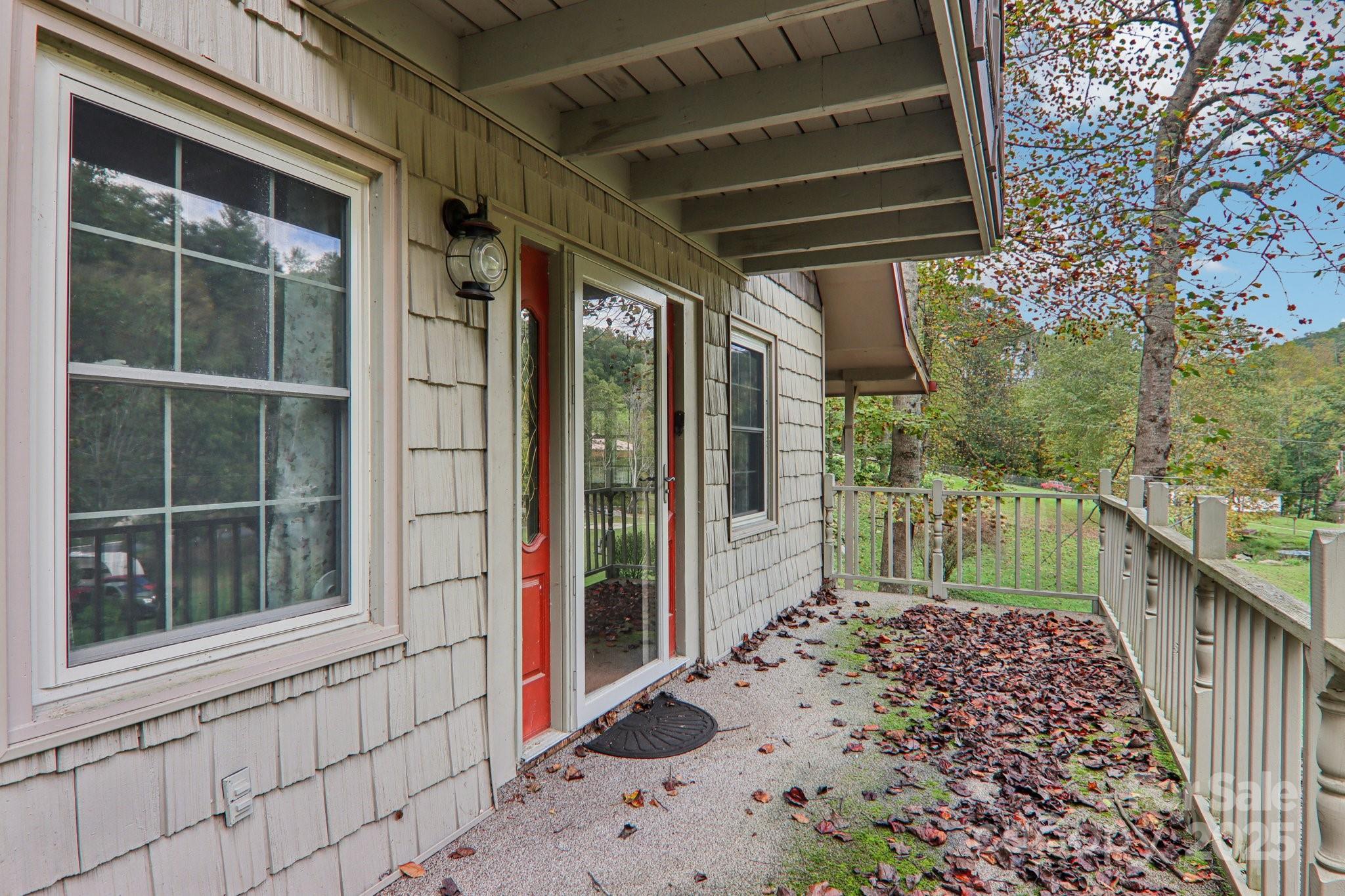 190 Turkey Creek Road Clyde, NC 28721 - Photo 11 of 48 a view of a house with a large window
