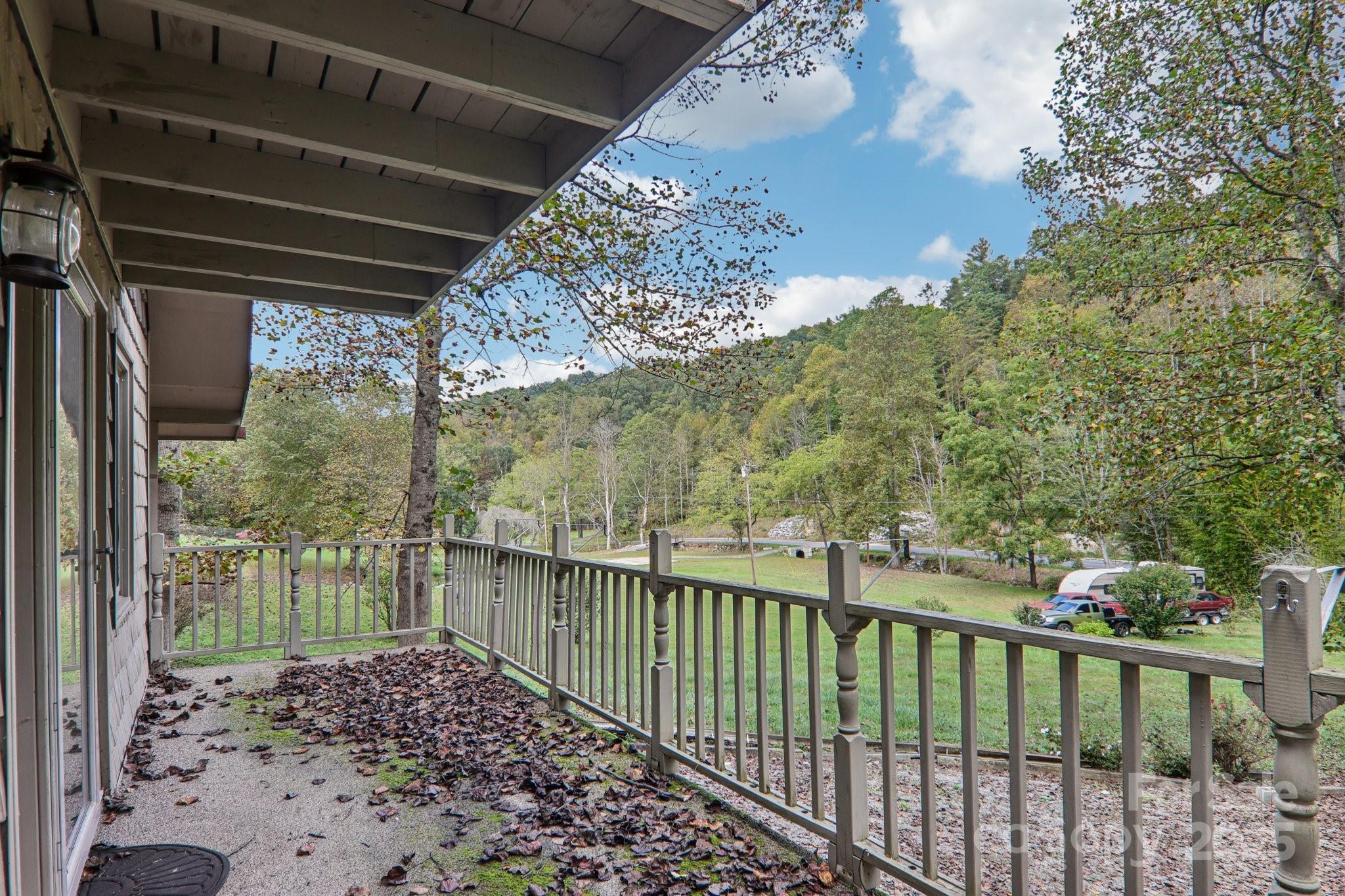 190 Turkey Creek Road Clyde, NC 28721 - Photo 12 of 48 a view of a porch