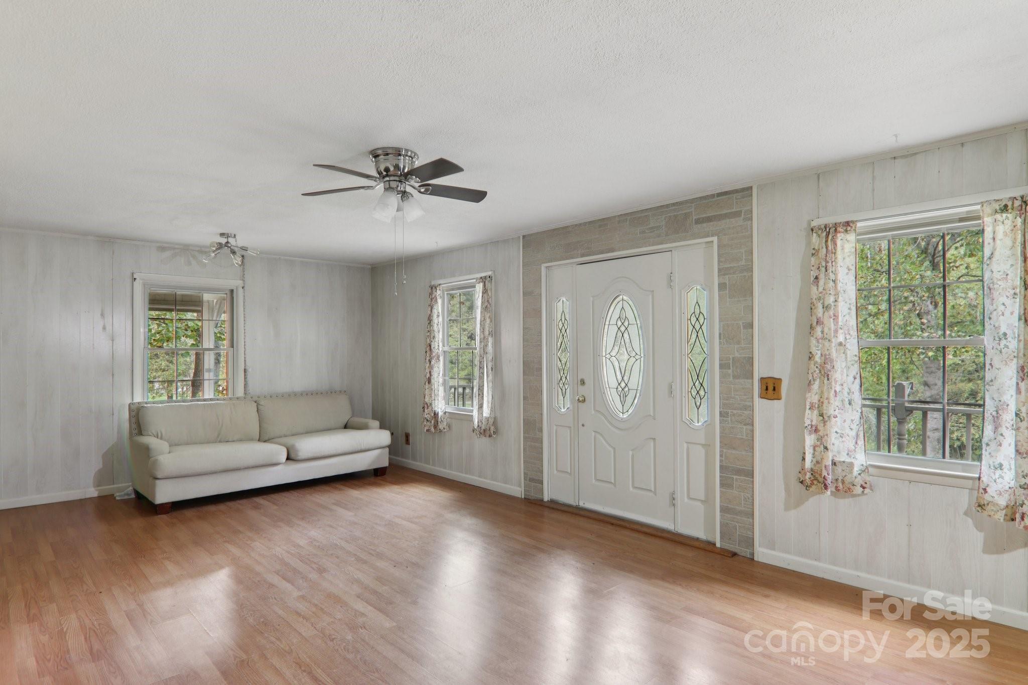190 Turkey Creek Road Clyde, NC 28721 - Photo 19 of 48 a living room with furniture and windows