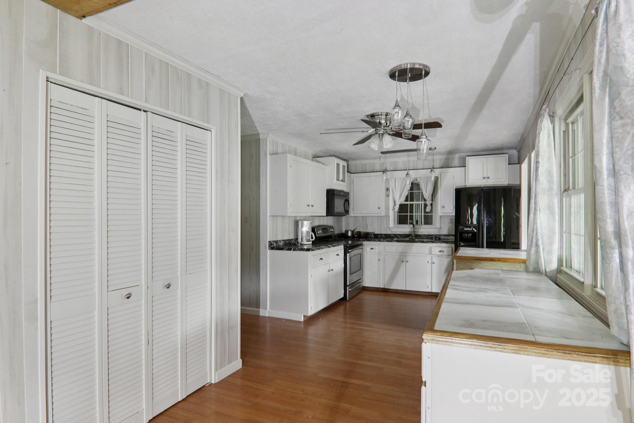 190 Turkey Creek Road Clyde, NC 28721 - Photo 23 of 48 a view of a kitchen with a sink and cabinets