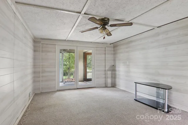 an empty room with windows