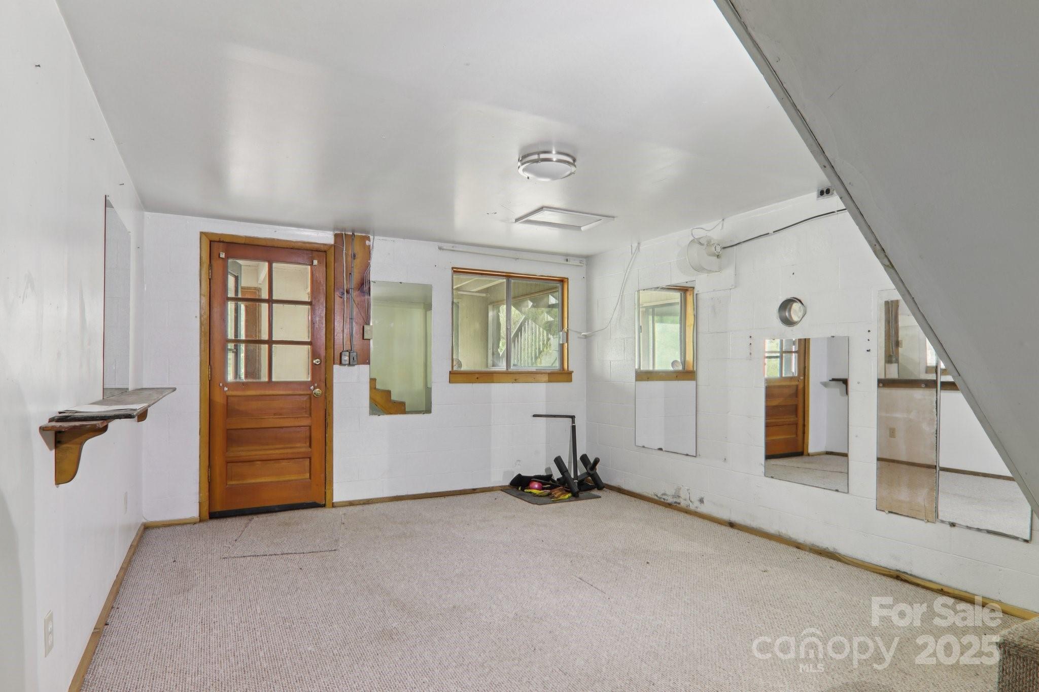 190 Turkey Creek Road Clyde, NC 28721 - Photo 30 of 48 an empty room with windows