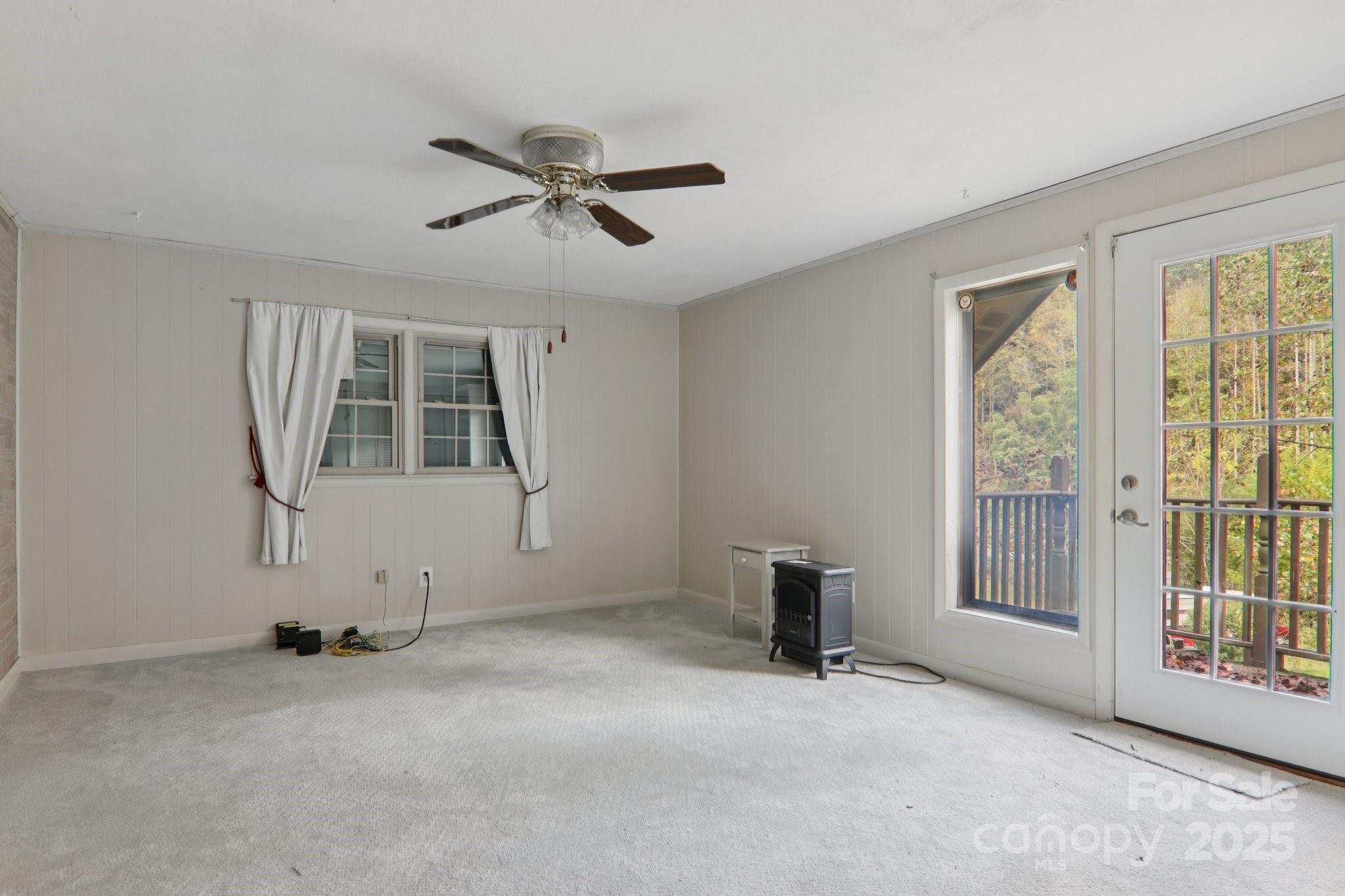 190 Turkey Creek Road Clyde, NC 28721 - Photo 36 of 48 a view of an empty room with a window