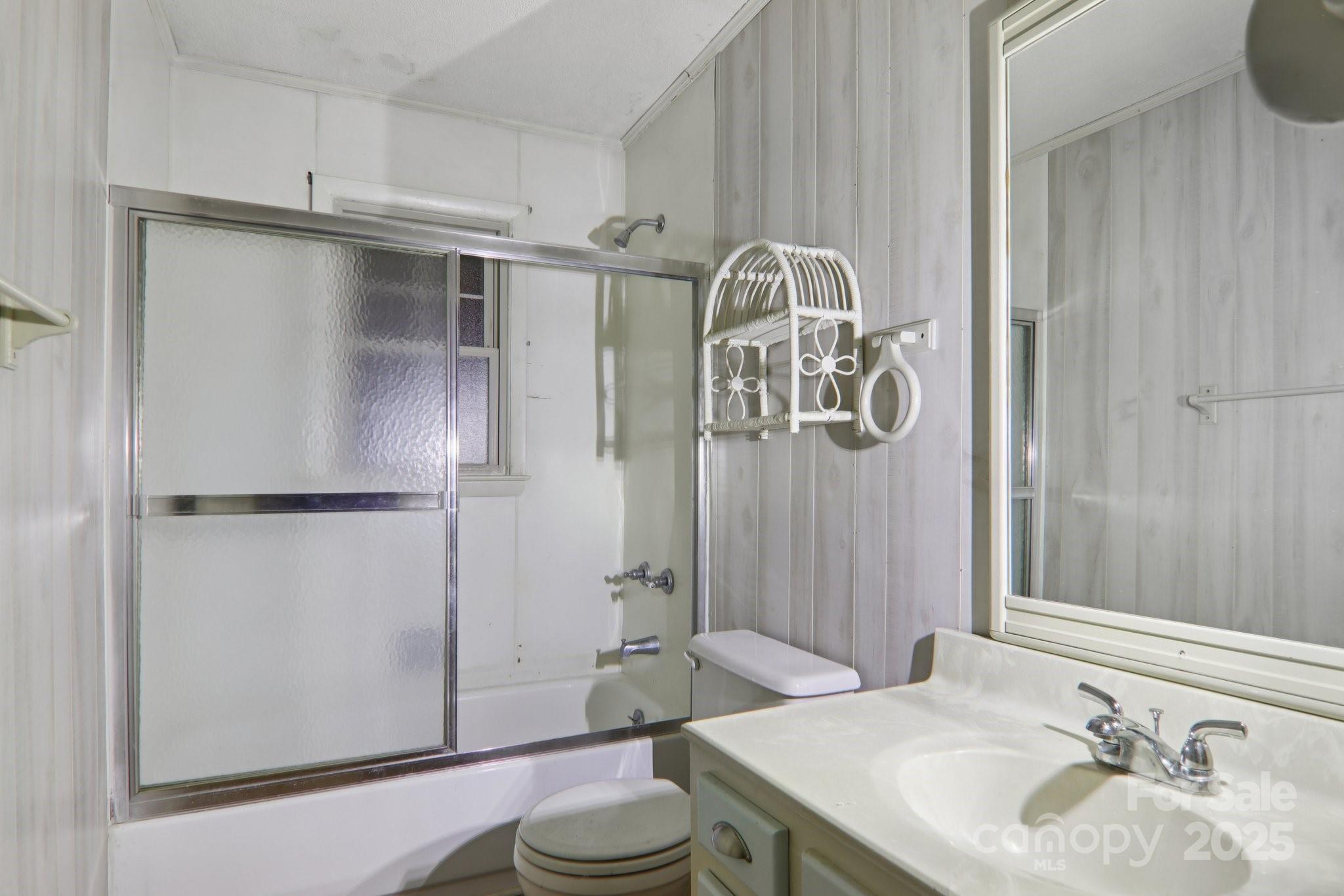 190 Turkey Creek Road Clyde, NC 28721 - Photo 42 of 48 a bathroom with a sink toilet and shower
