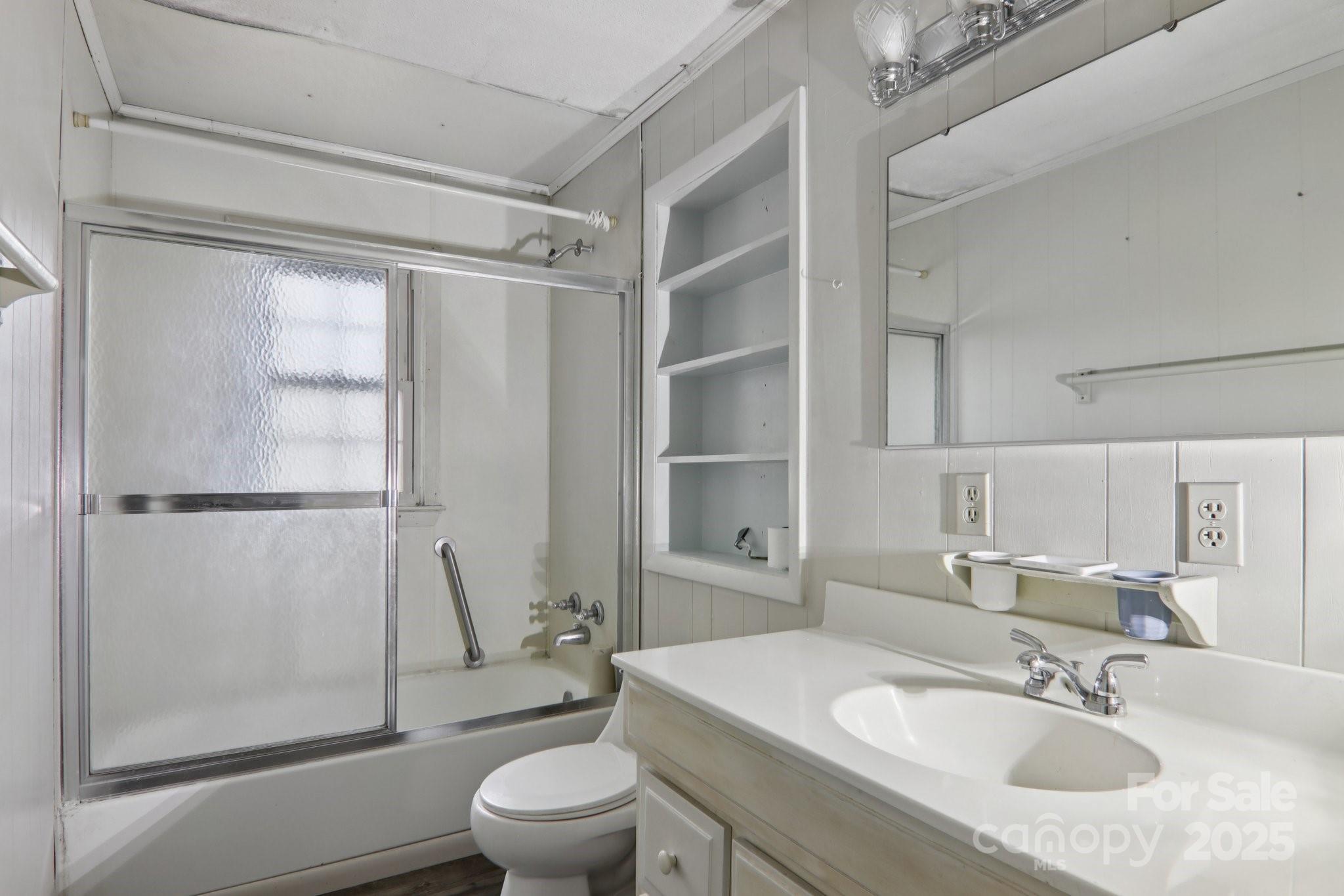 190 Turkey Creek Road Clyde, NC 28721 - Photo 43 of 48 a bathroom with a sink toilet and shower