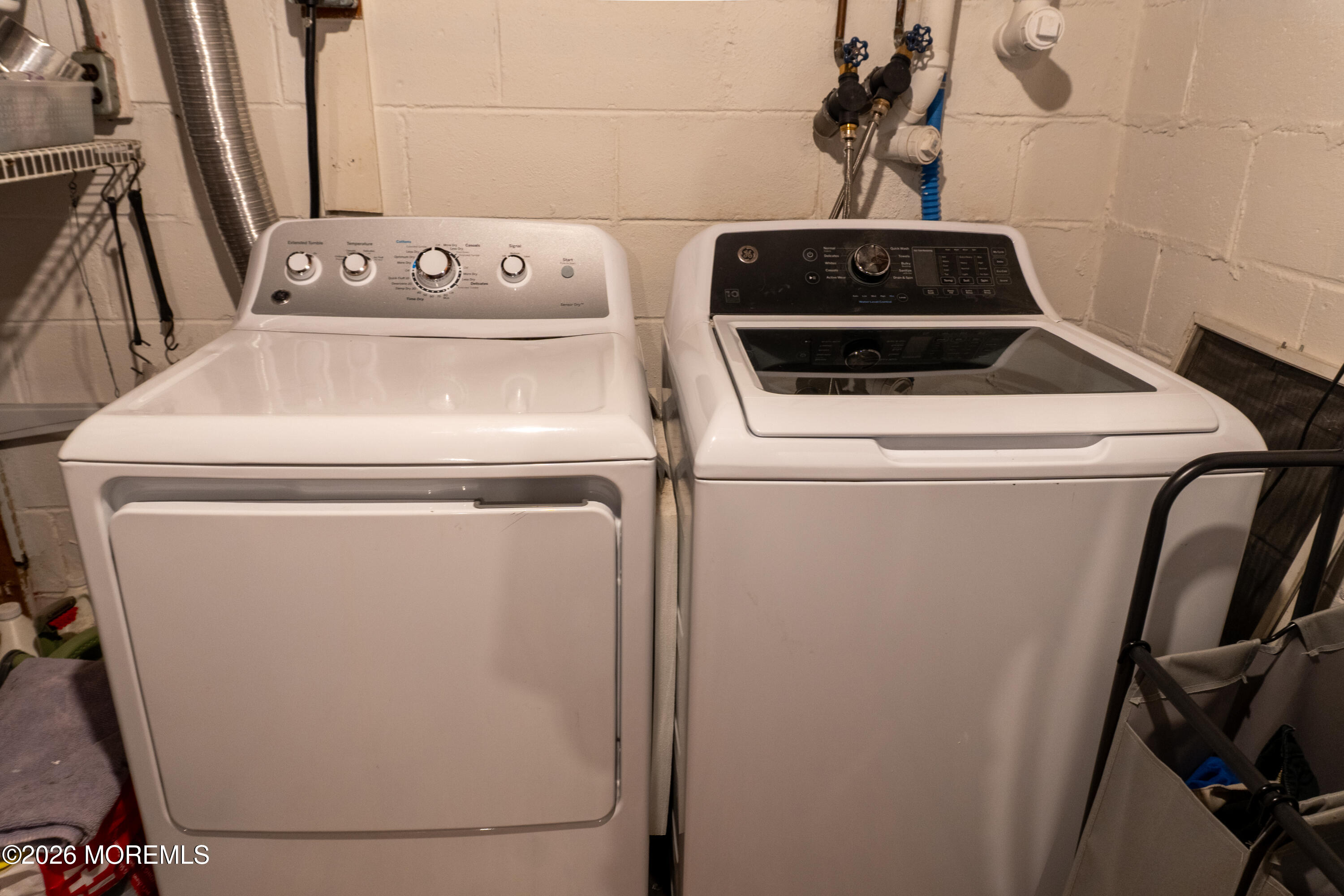 55 Toms River Road Jackson, NJ 08527 - Photo 23 of 31 a utility room with dryer and washer