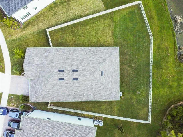 a view of kitchen with stainless steel appliances granite countertop cabinets and a stove