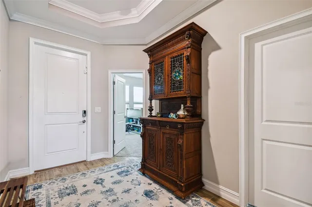 a view of a kitchen with granite countertop cabinets