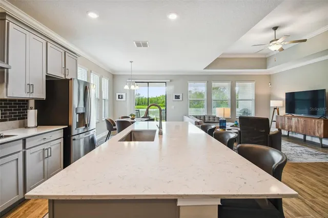 a view of a lake with a house in the background