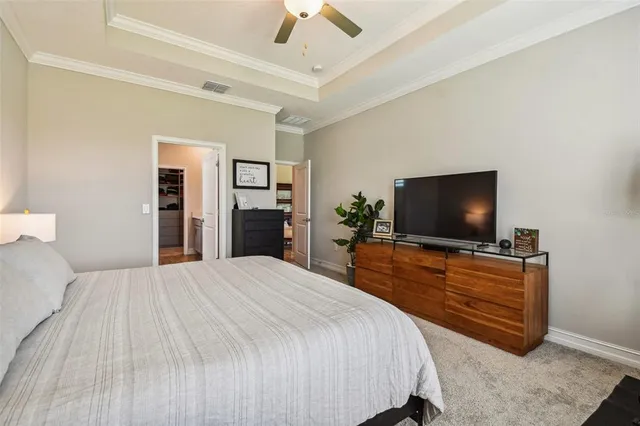 a view of a swimming pool with a table and chairs