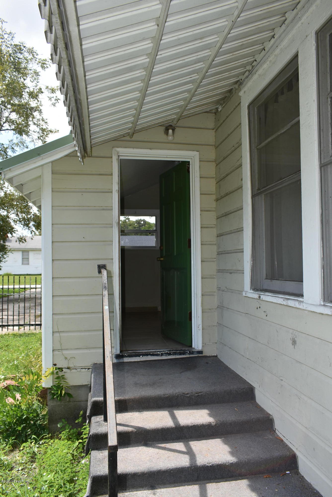 4609 Birkenhead Road Jacksonville, FL 32210 - Photo 31 of 39 Back Entrance to Laundry
