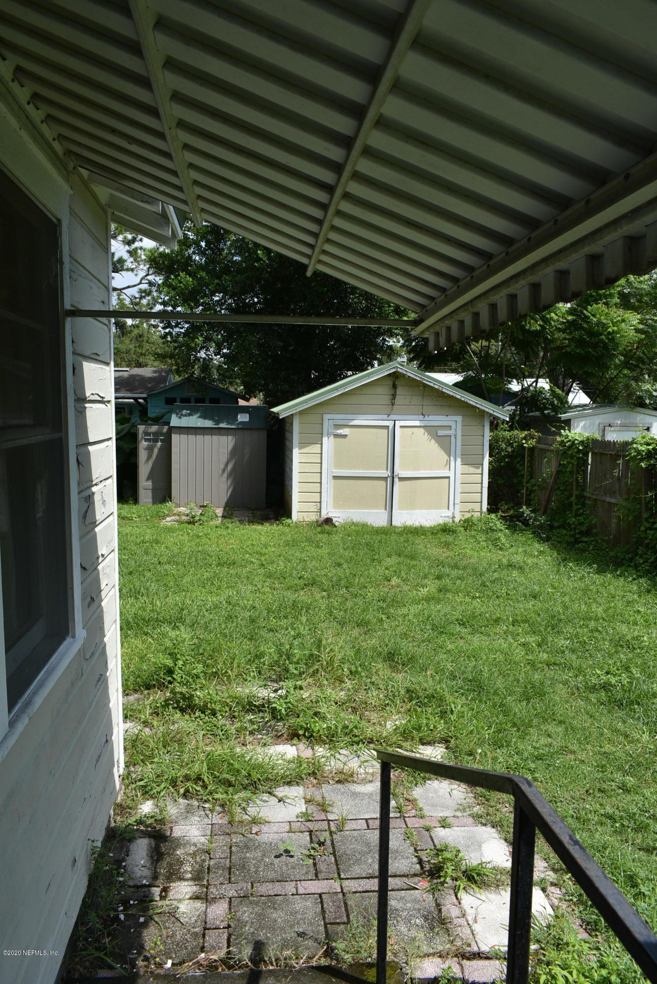 4609 Birkenhead Road Jacksonville, FL 32210 - Photo 32 of 39 Back Door to Backyard