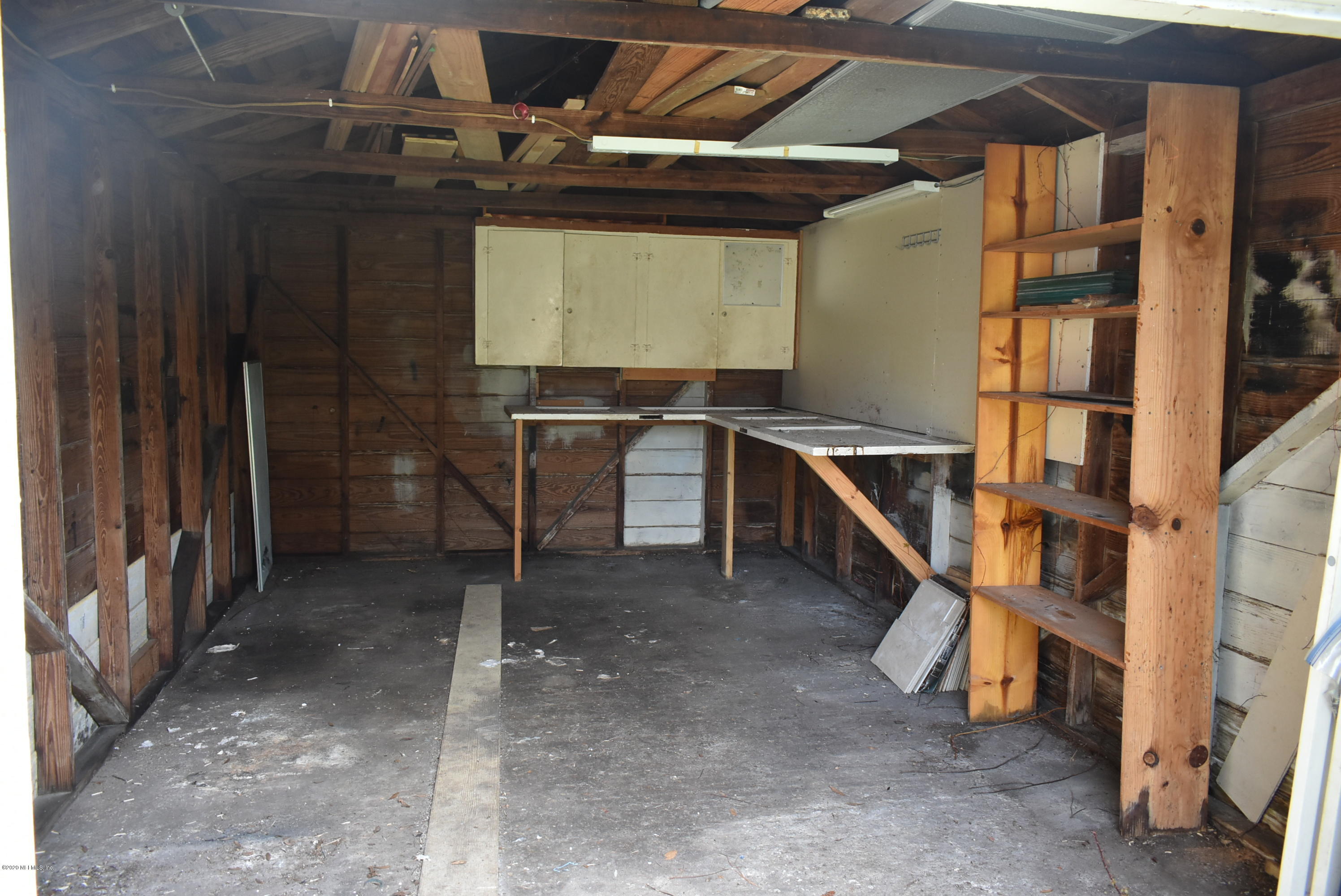 4609 Birkenhead Road Jacksonville, FL 32210 - Photo 36 of 39 Inside Garage