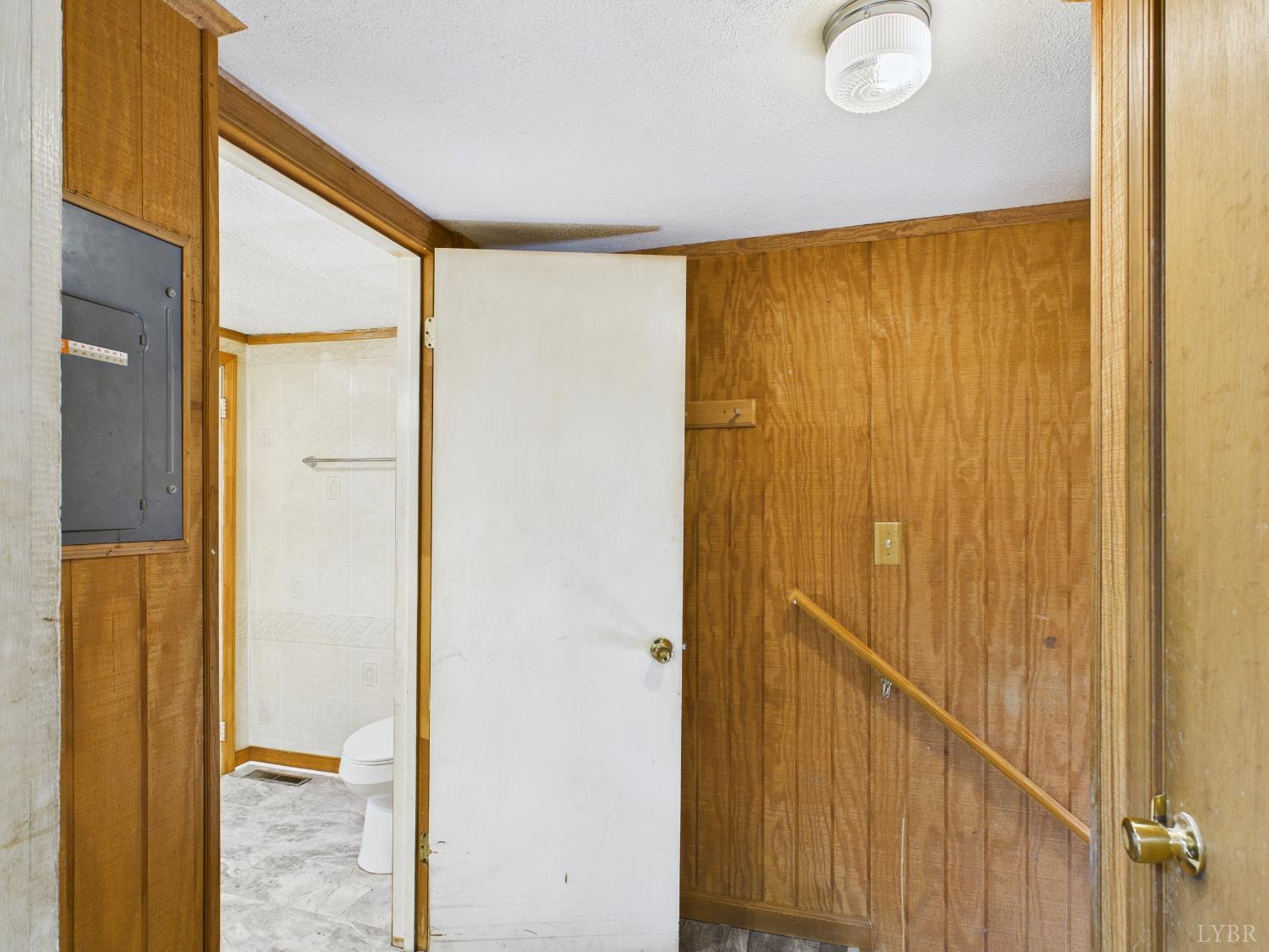 203 Juniper Cliff Road Brookneal, VA 24528 - Photo 20 of 44 a bathroom with a shower and a glass door