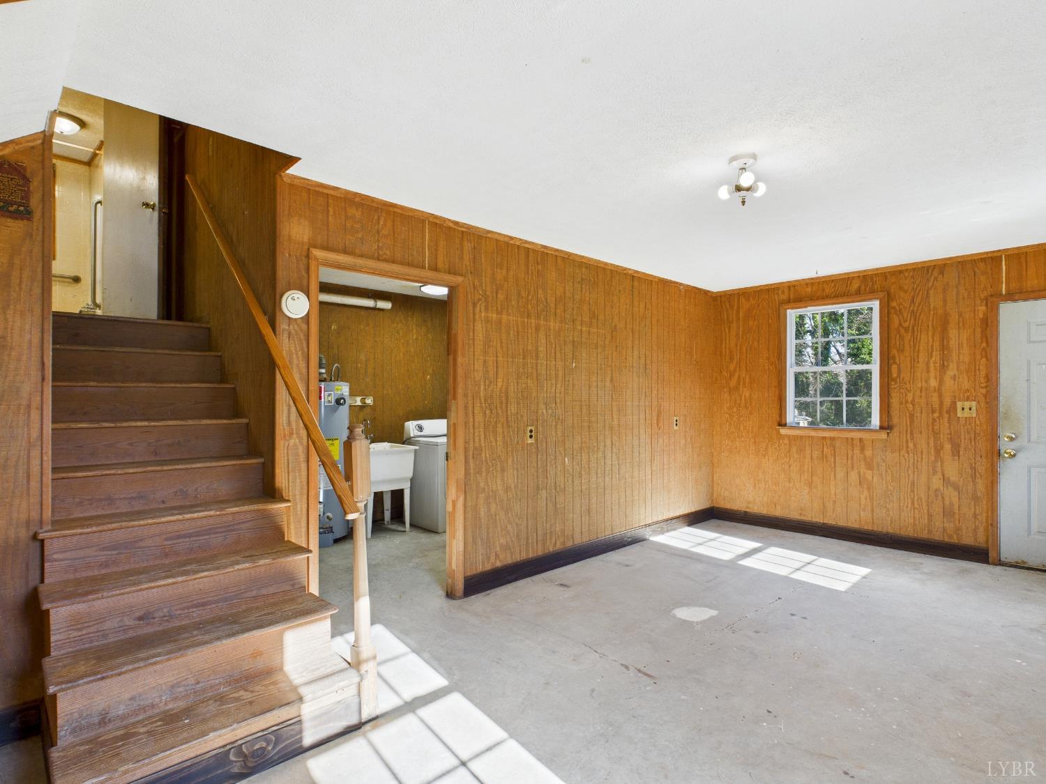 203 Juniper Cliff Road Brookneal, VA 24528 - Photo 22 of 44 a view of an entryway with wooden floor and a cabinet