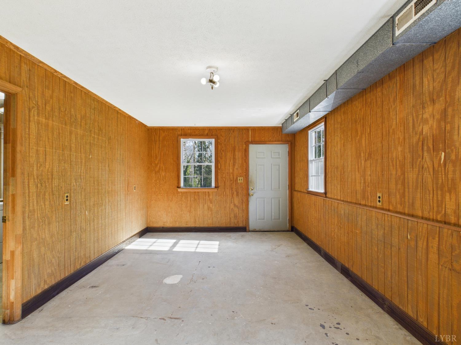 203 Juniper Cliff Road Brookneal, VA 24528 - Photo 23 of 44 a view of an empty room with a window