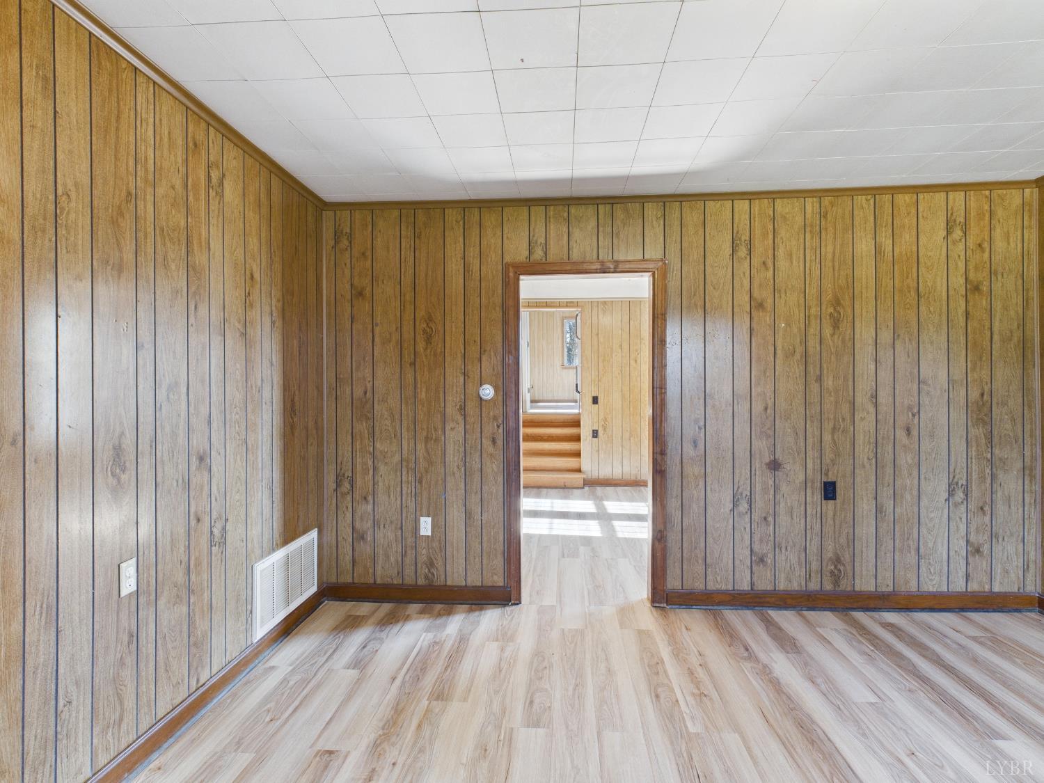 203 Juniper Cliff Road Brookneal, VA 24528 - Photo 6 of 44 a view of a room with wooden floor and entryway