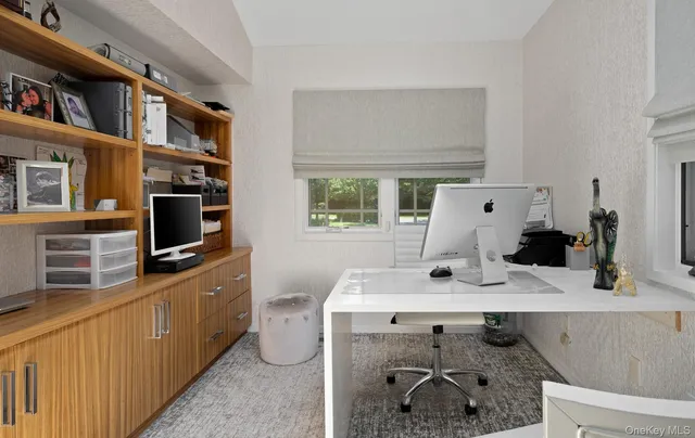 a bathroom with a sink a vanity and a mirror
