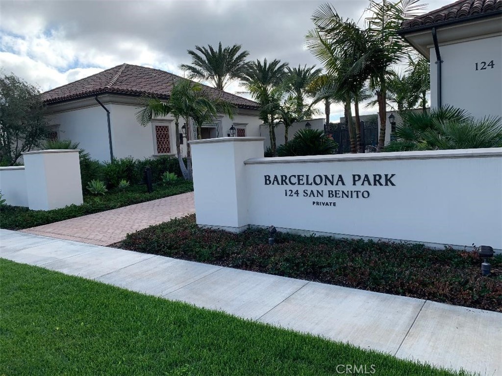 104 San Benito Irvine, CA 92618 - Photo 16 of 19 a view of a house with a yard and potted plants