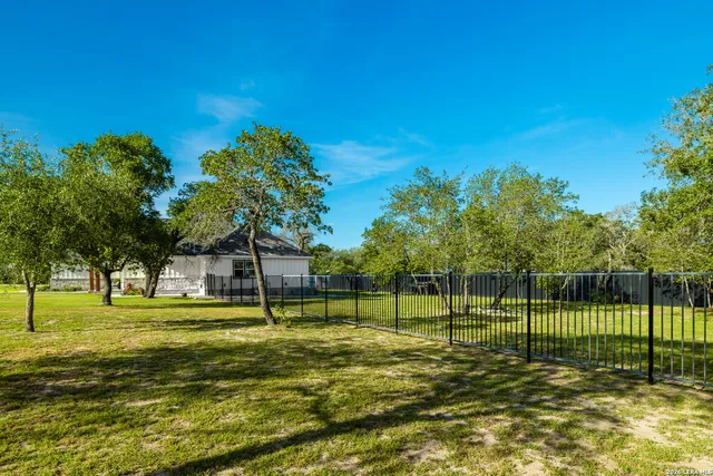 a view of a park with a big yard