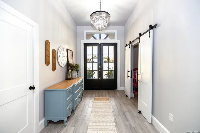 a view of hallway with windows