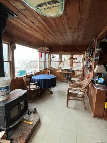 a outdoor space with patio furniture and a fireplace