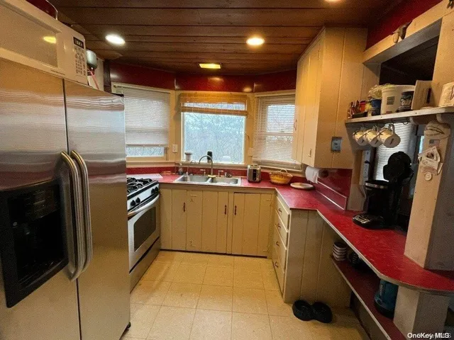 a utility room with washer and dryer