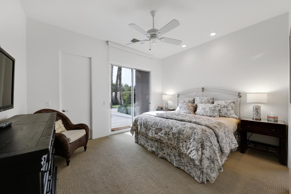70955 Sunny Lane Rancho Mirage, CA 92270 - Photo 18 of 35 a bedroom with bed and window